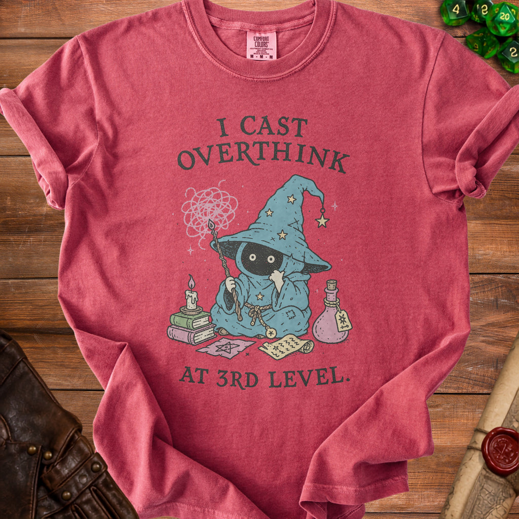 Red t-shirt with graphic: wizard overthinking with spell books and potion, reading "I Cast Overthink At 3rd Level."