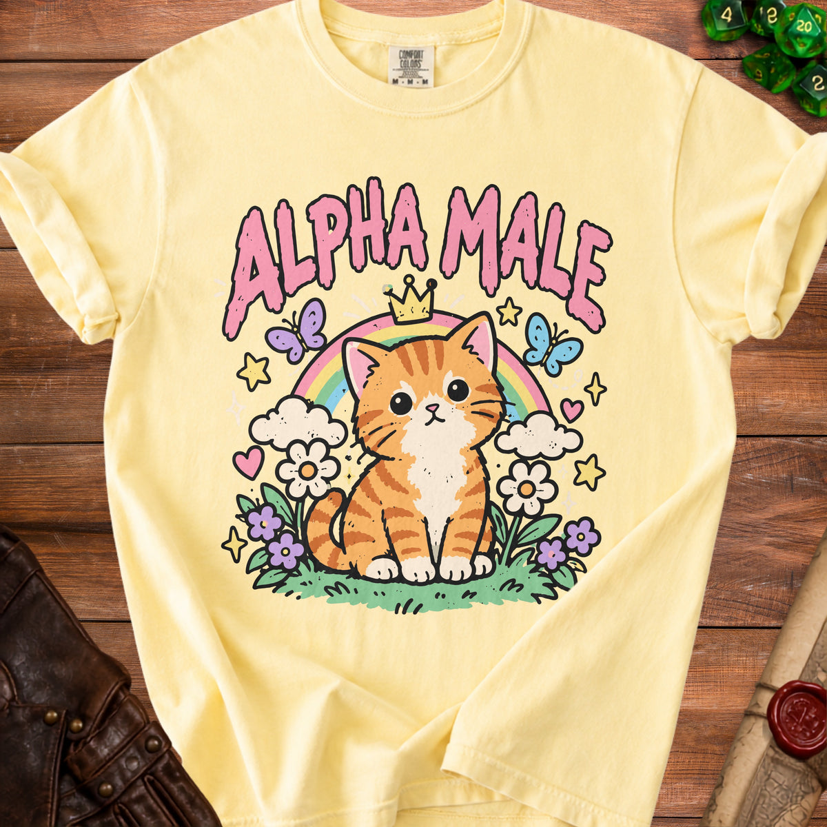 Yellow t-shirt with cartoon cat, rainbow, and text "ALPHA MALE".