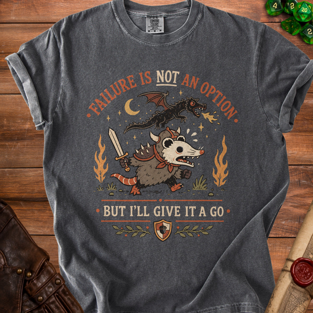 Dark gray t-shirt with a possum fighting a dragon, reads "Failure is not an option".