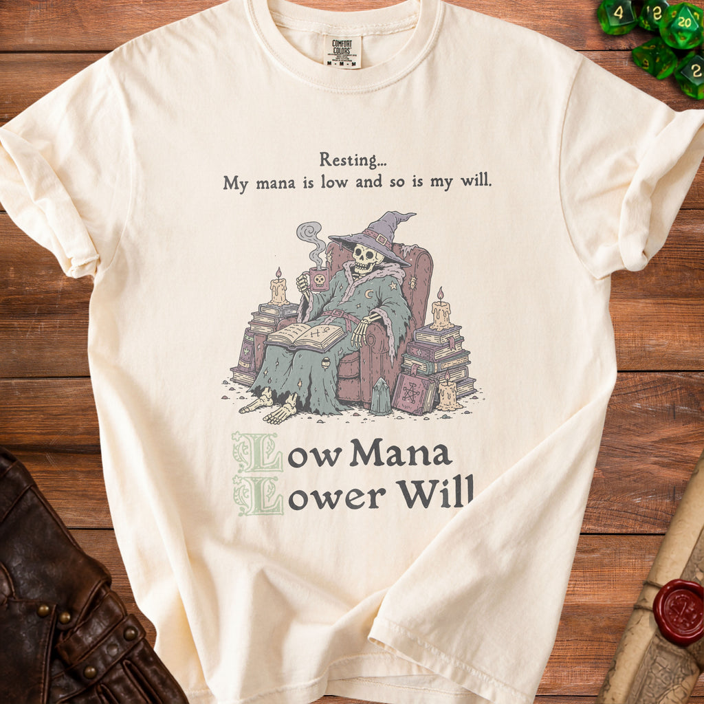 Cream t-shirt with a skeleton wizard graphic and text about low mana and will.