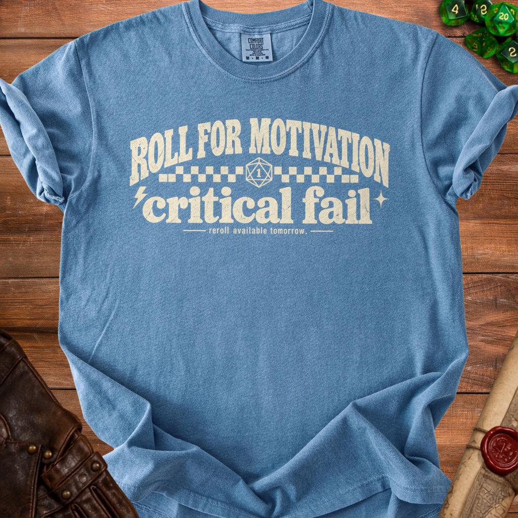 Blue t-shirt with "Roll for Motivation Critical Fail" text and D20 dice graphic.