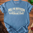 Blue t-shirt with "Roll for Motivation Critical Fail" text and D20 dice graphic.