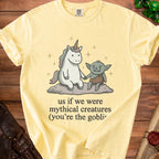 Yellow t-shirt with unicorn and goblin graphic and text "us if we were mythical creatures".