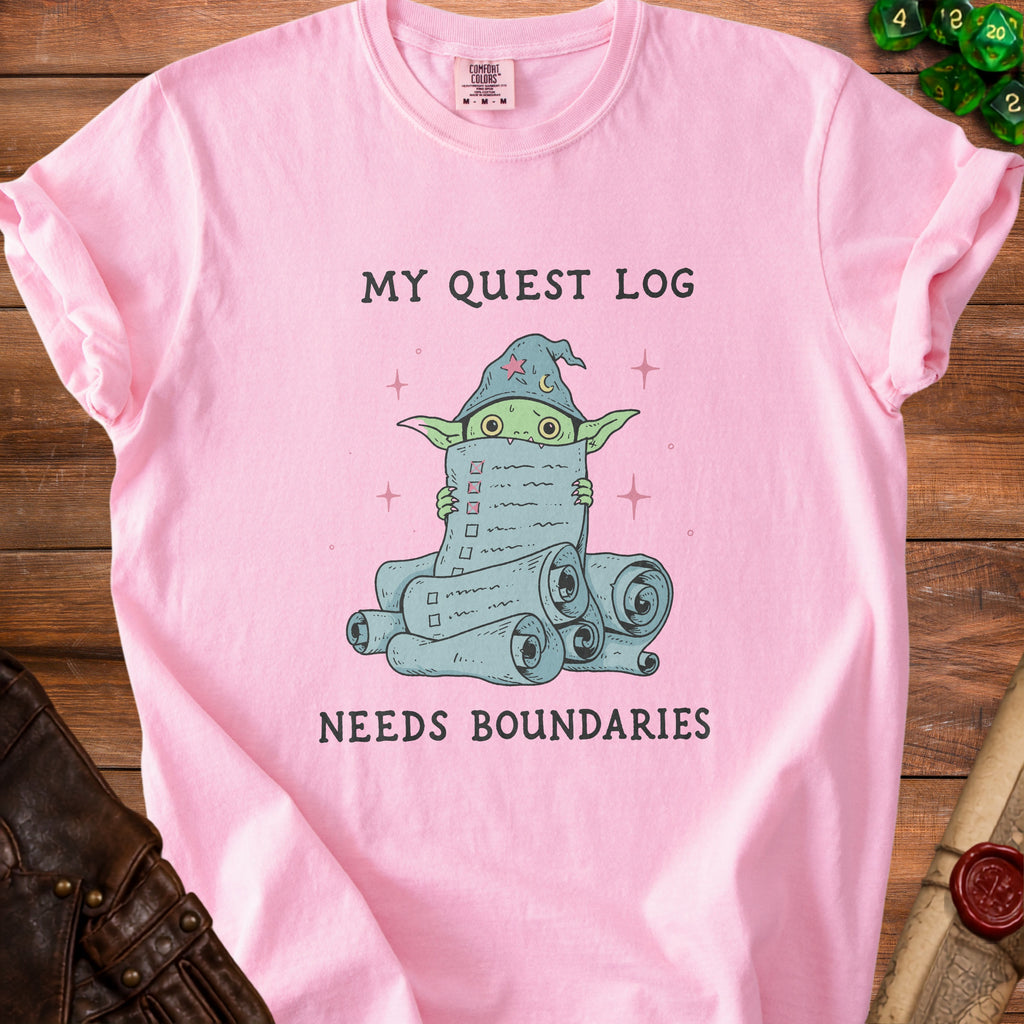 Pink t-shirt with a wizard goblin and text "MY QUEST LOG NEEDS BOUNDARIES".