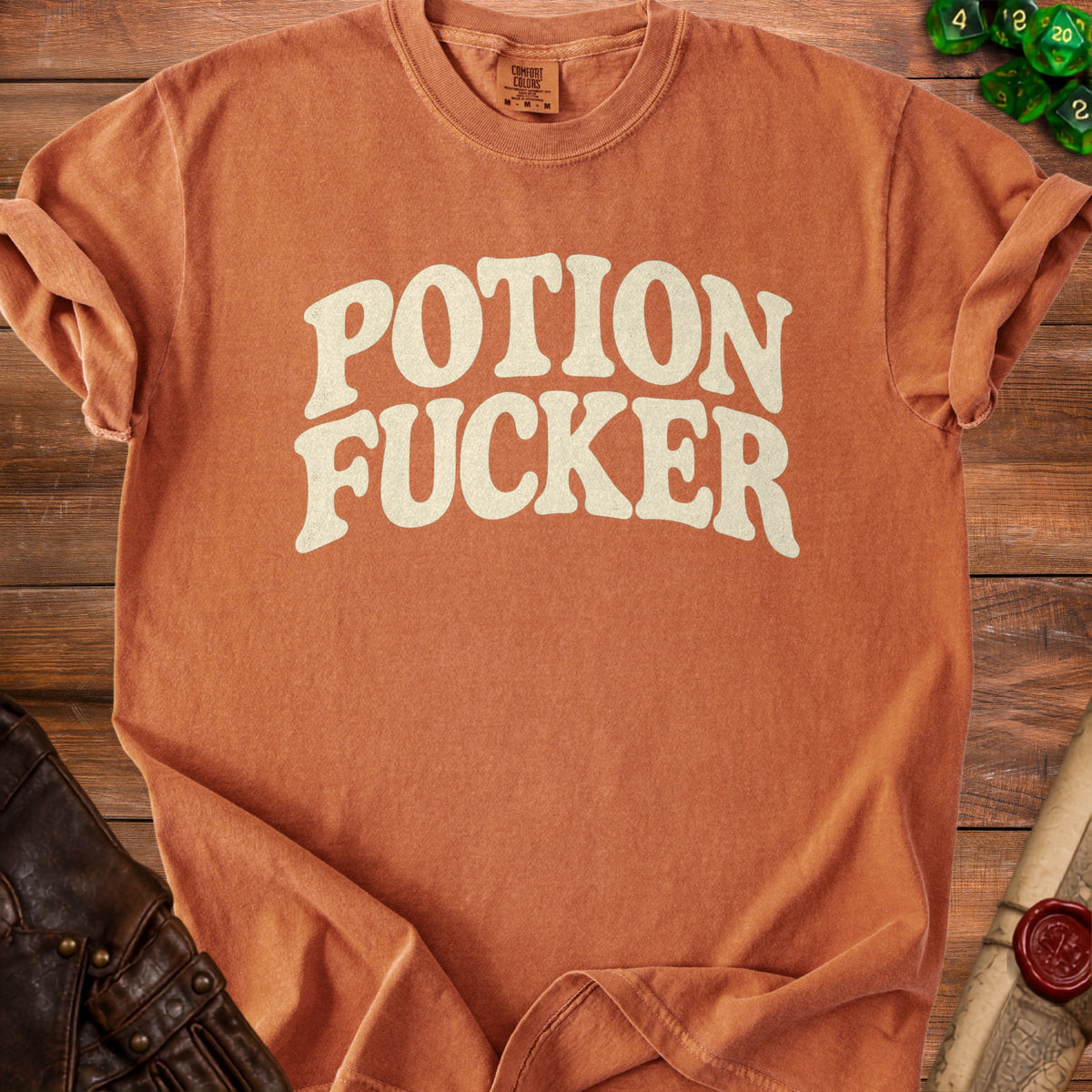 Comfort Colors t-shirt with "Potion Fucker" text in white and green dice