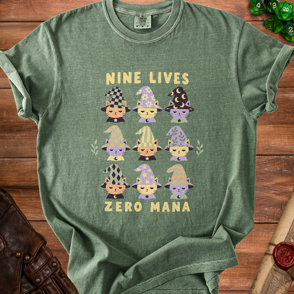 Green t-shirt with cartoon cats in wizard hats saying "NINE LIVES ZERO MANA".