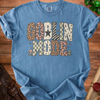Blue t-shirt with "Goblin Mode" text in distressed, patterned block letters.
