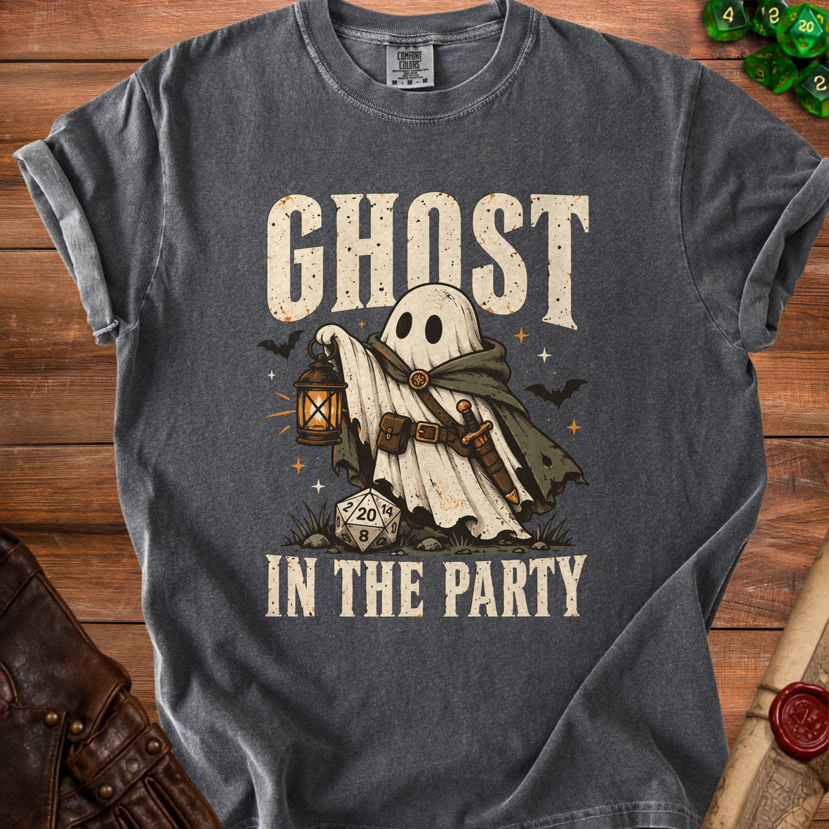 T-shirt with "GHOST IN THE PARTY" text and a ghost character holding a lantern.