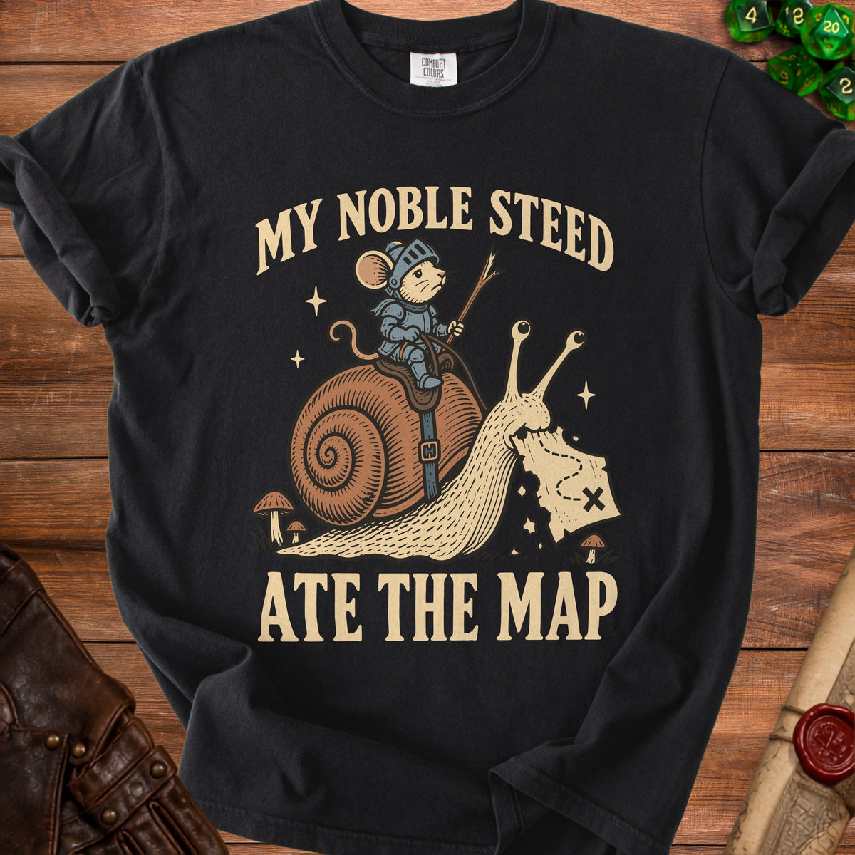 Black t-shirt with knight mouse riding a snail, reading "My Noble Steed Ate The Map".