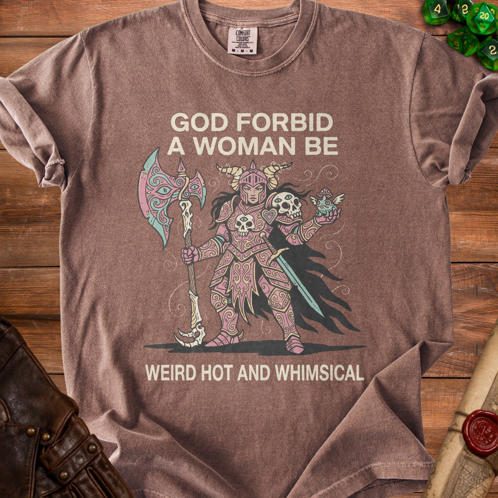 T-shirt with text "GOD FORBID A WOMAN BE WEIRD HOT AND WHIMSICAL" and warrior graphic.