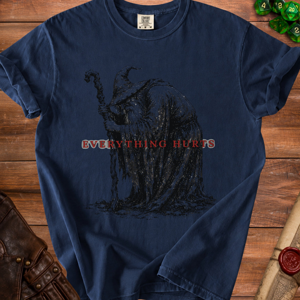 Dark t-shirt with a black wizard graphic and "EVERYTHING HURTS" text.