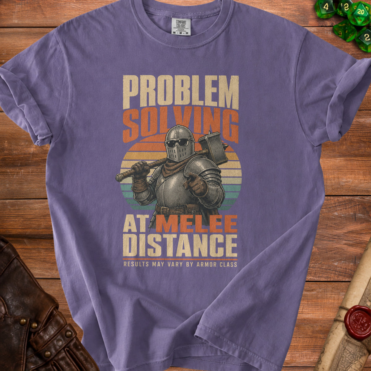 Purple t-shirt with knight graphic: "Problem Solving At Melee Distance" and "Results May Vary By Armor Class".