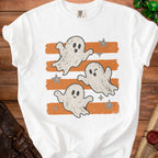 White t-shirt with three distressed ghosts and stars on orange stripes.
