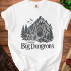 White t-shirt with "I love Big Dungeons" text and mountain cave graphic.