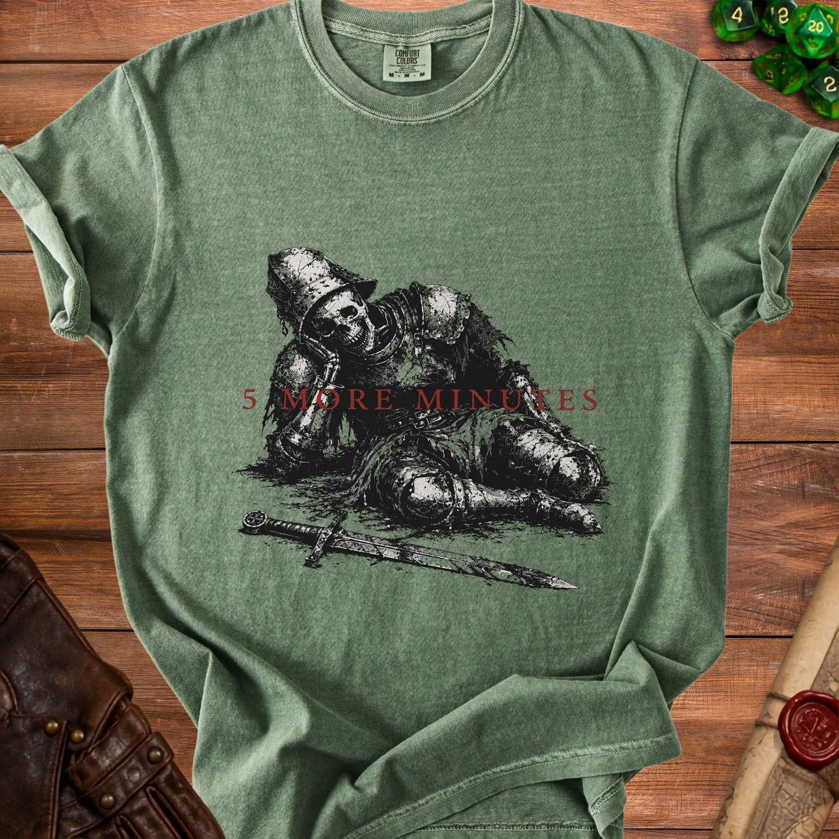 T-shirt with a resting skeleton knight and sword graphic, text "5 MORE MINUTES".