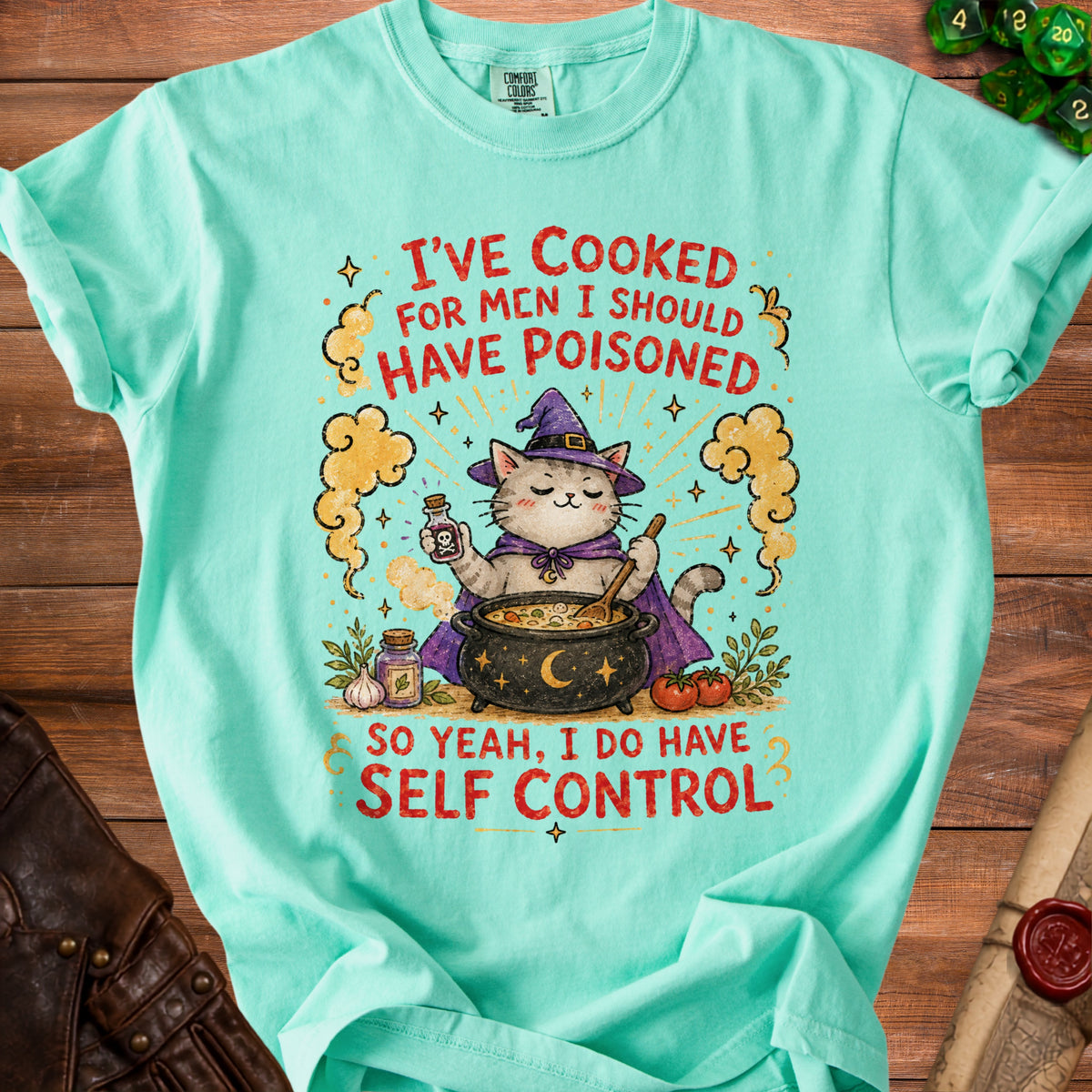 Cat witch brewing poison with text "I've cooked for men I should have poisoned."