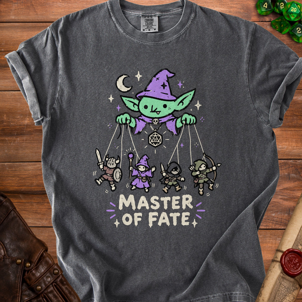 Dark gray t-shirt with "Master of Fate" text and a goblin puppet master with fantasy characters.
