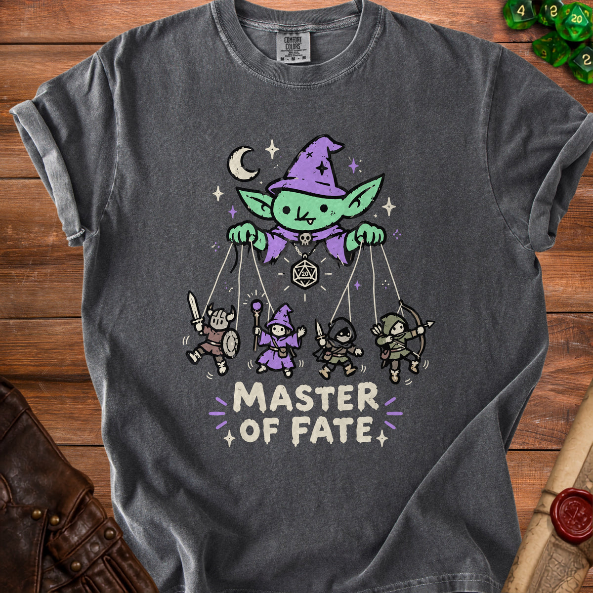 Dark gray t-shirt with "Master of Fate" text and a goblin puppet master with fantasy characters.