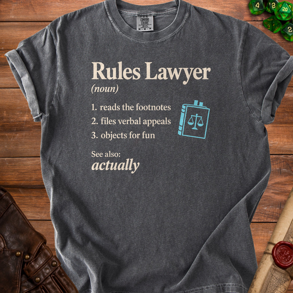 Rules Lawyer definition on gray t-shirt with book and scales icon.
