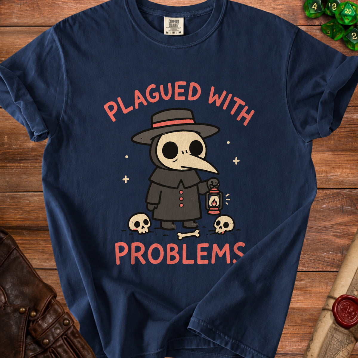 Navy t-shirt with plague doctor character, lantern, skulls, and text "PLAGUED WITH PROBLEMS".