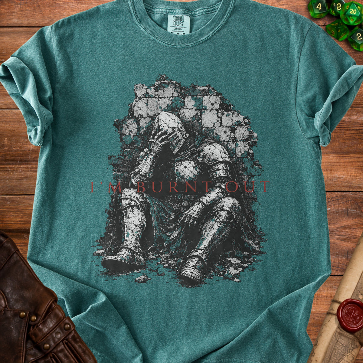 T-shirt featuring a knight slumped against a stone wall with "I'M BURNT OUT" text.