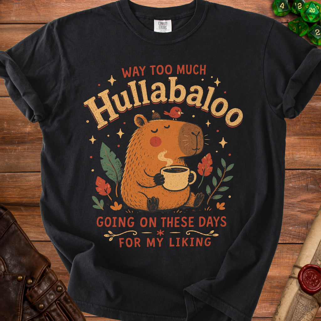 Black t-shirt with capybara graphic and text "Way Too Much Hullabaloo Going On These Days For My Liking".
