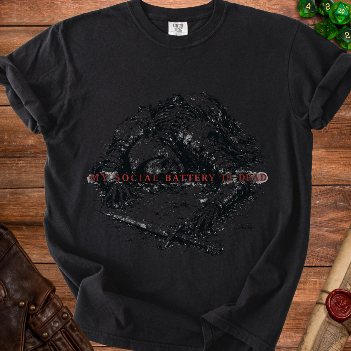 Black t-shirt with graphic of a skeleton knight and text "MY SOCIAL BATTERY IS DEAD".