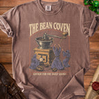 T-shirt with monks grinding coffee, "The Bean Coven" and "Gather for the Daily Grind".