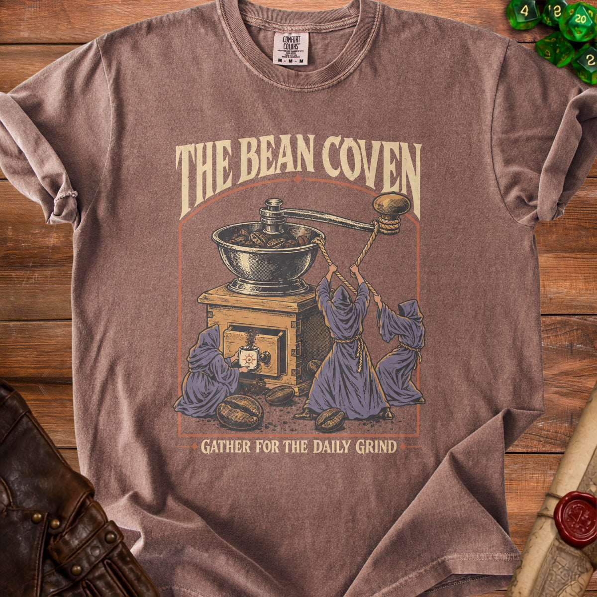 T-shirt with monks grinding coffee, "The Bean Coven" and "Gather for the Daily Grind".