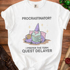 White t-shirt with "Procrastinator? I prefer the term Quest Delayer" and wizard graphic.