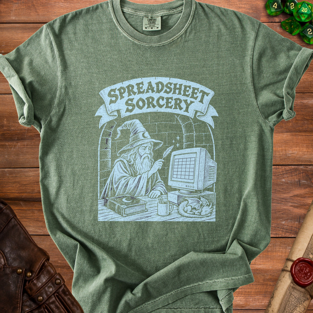 Green t-shirt with "Spreadsheet Sorcery" text, wizard, computer, and dragon graphic.