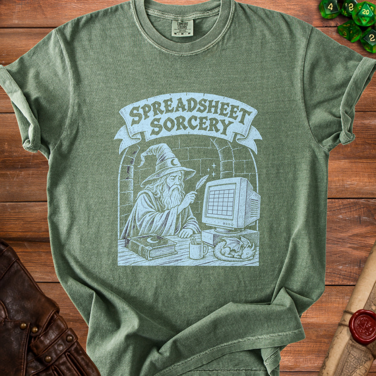Green t-shirt with "Spreadsheet Sorcery" text, wizard, computer, and dragon graphic.