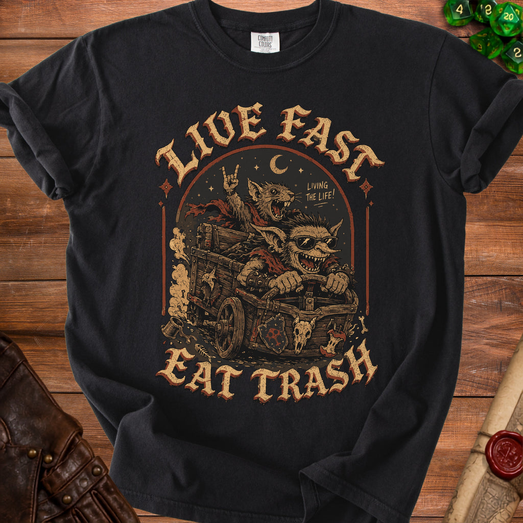 Black t-shirt with "Live Fast Eat Trash" graphic of goblins in a cart.