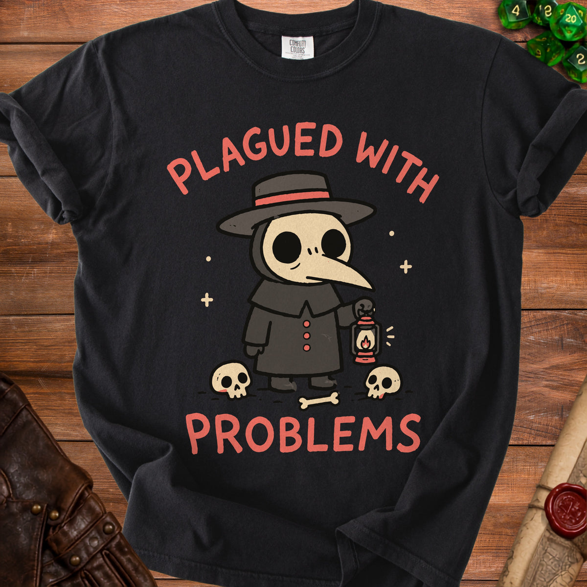 Black t-shirt with plague doctor, skulls, bone, and "PLAGUED WITH PROBLEMS" text.