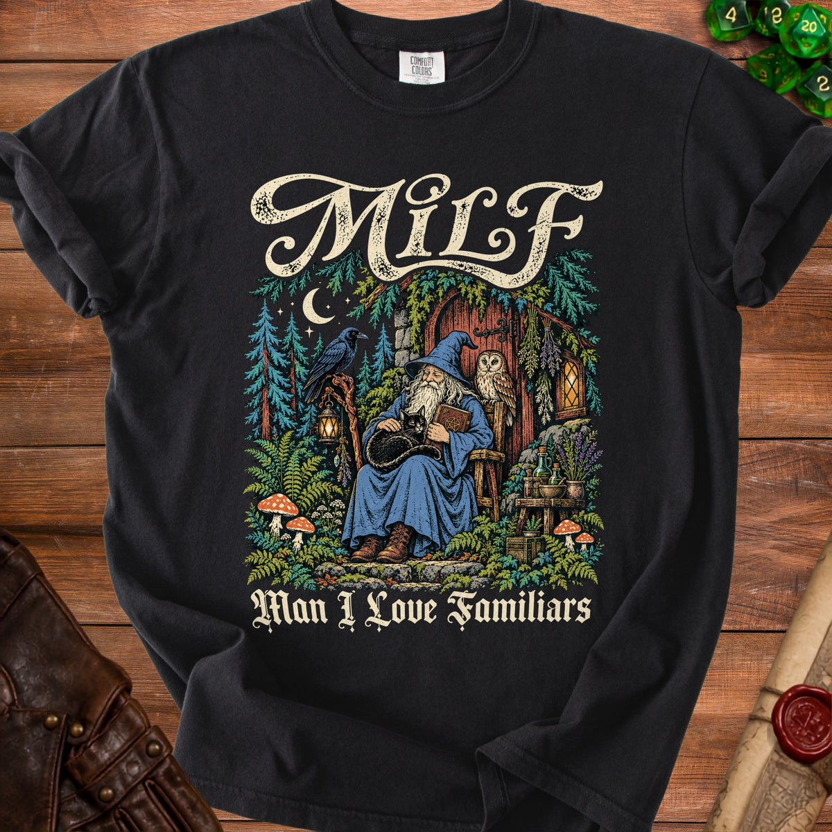 Black t-shirt with graphic of wizard, cat, owl, raven, and text "MILF Man I Love Familiars".