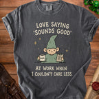 Dark gray t-shirt with gnome saying "Love saying 'Sounds good' at work when I couldn't care less."
