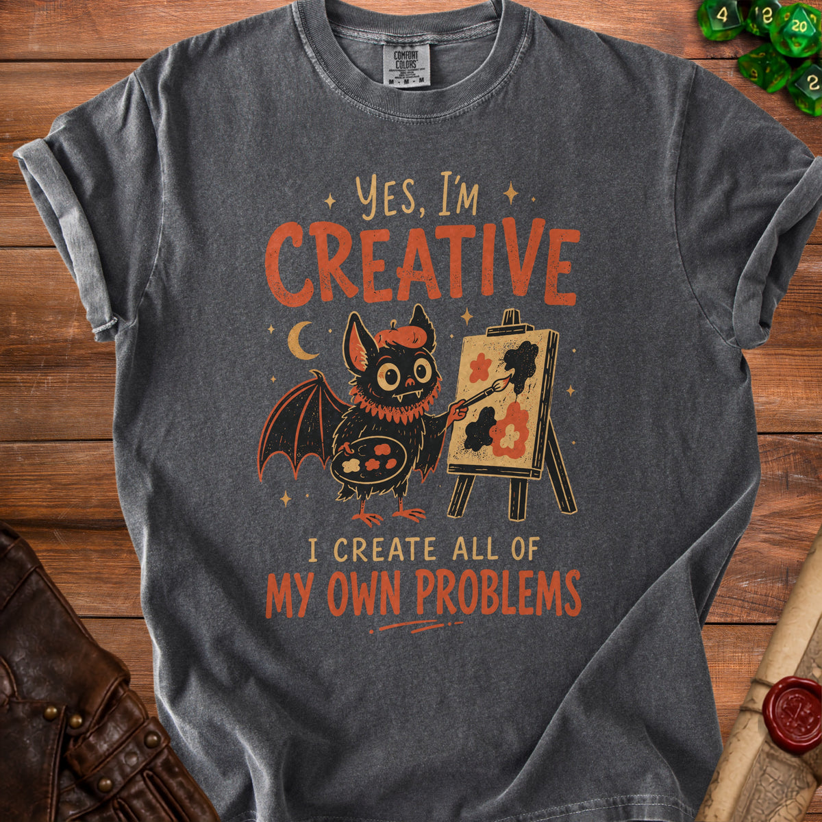 Dark grey t-shirt with a bat painting a canvas, text "Yes I'm Creative I Create All of My Own Problems".