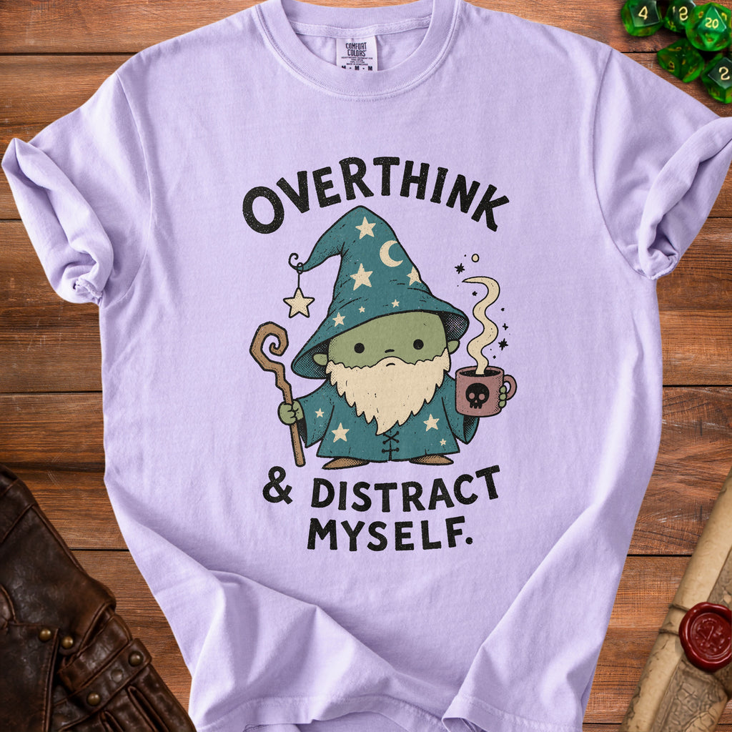 Lavender t-shirt with a wizard graphic and text "Overthink & Distract Myself".