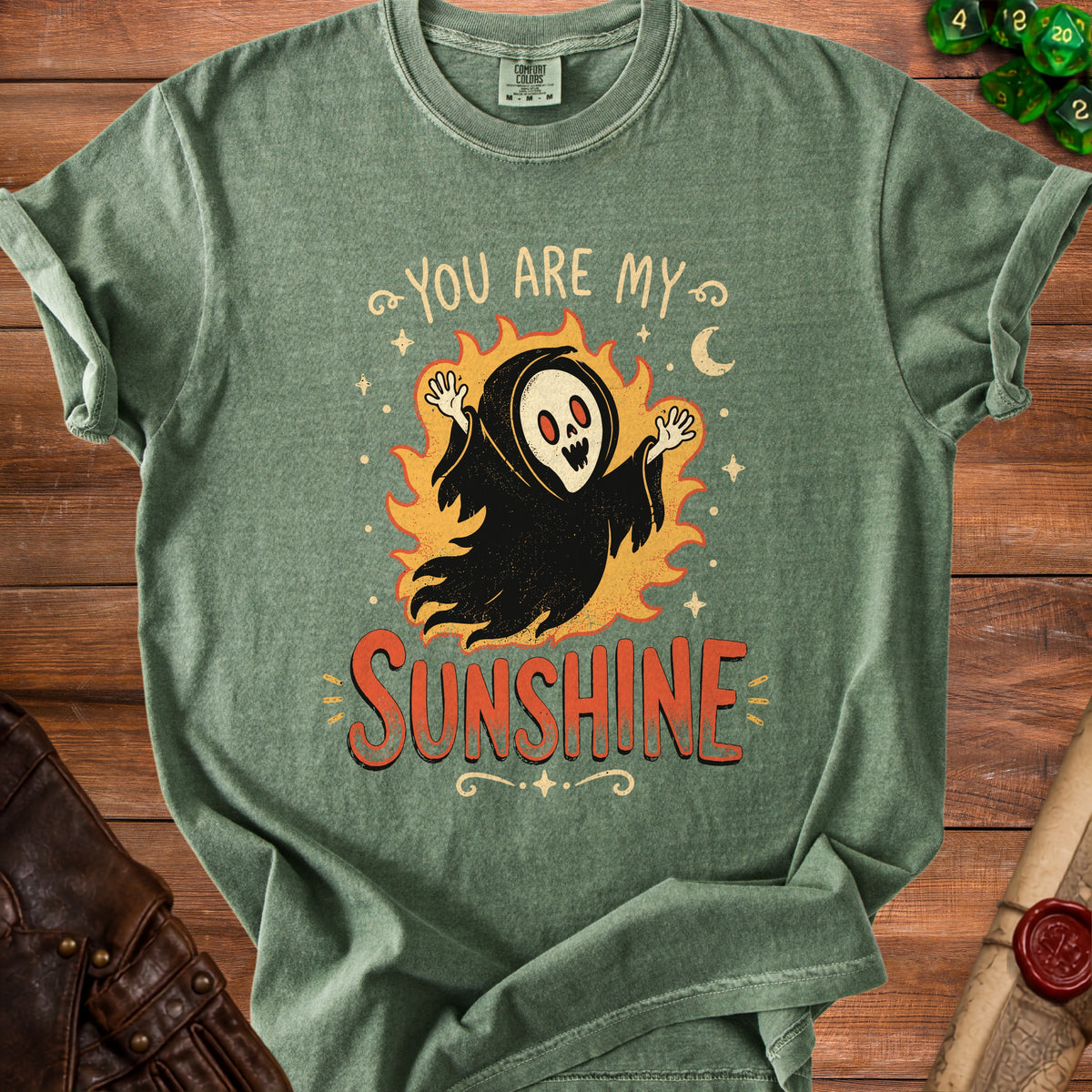 Green t-shirt with ghost graphic and text "You Are My Sunshine".