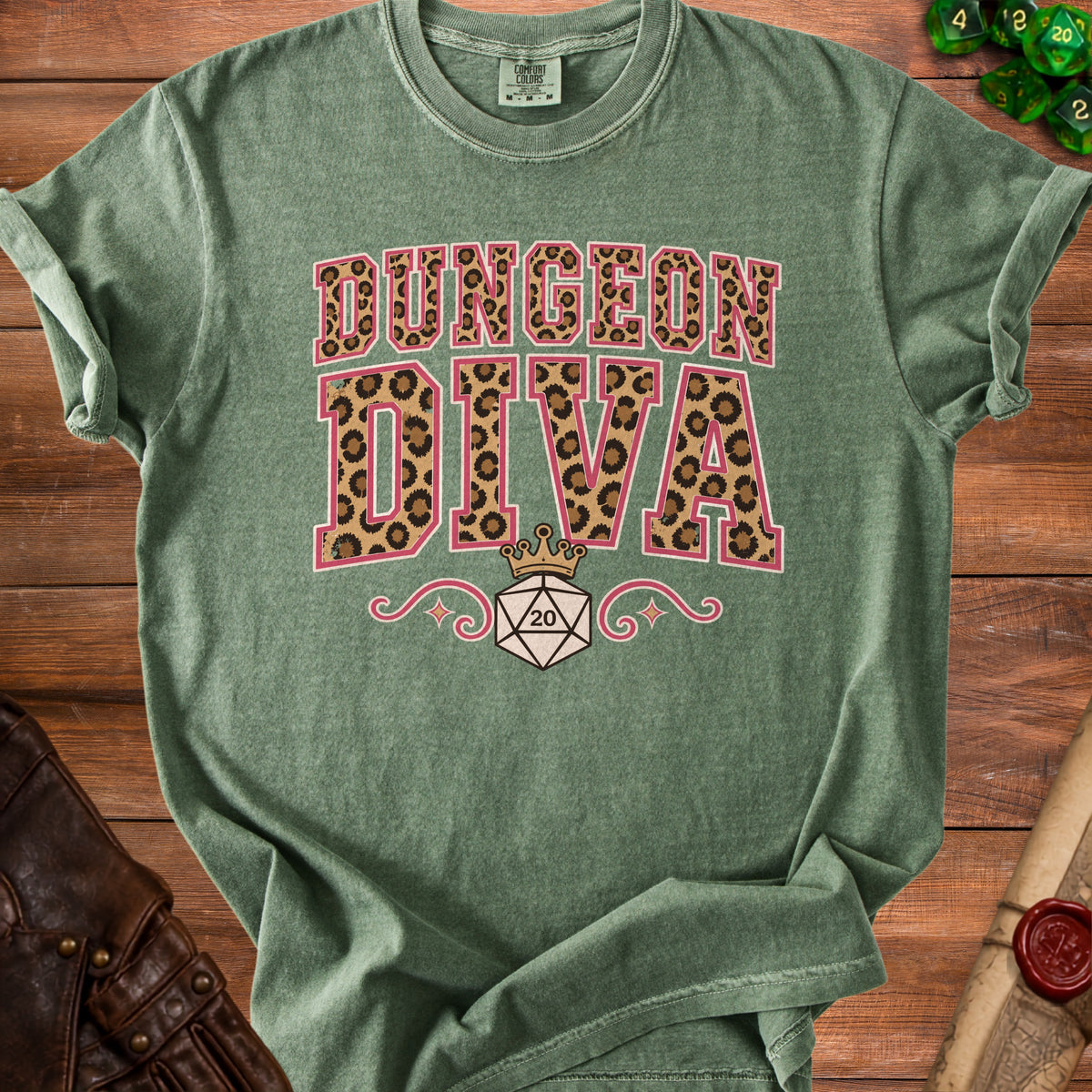 Green t-shirt with "DUNGEON DIVA" text and a D20 die graphic.