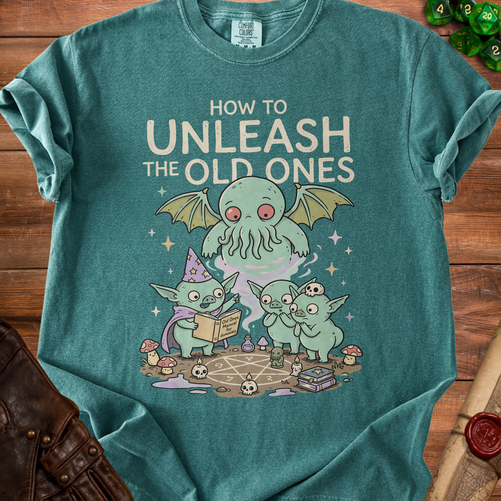 Green t-shirt with illustration of Cthulhu and goblins reading "Old Ones Manual for Dummies."