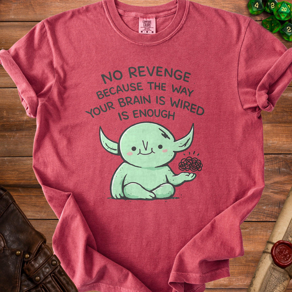 Red t-shirt with green cartoon character and "NO REVENGE BECAUSE THE WAY YOUR BRAIN IS WIRED IS ENOUGH" text.