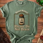 Green t-shirt with a graphic of a battery labeled "Social Battery -5% Remaining Please Do Not Drain".