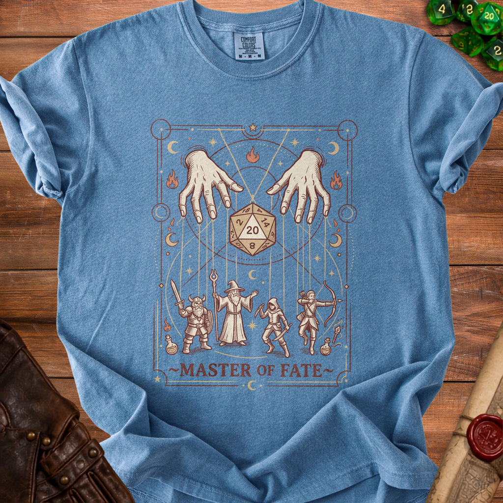 Blue t-shirt with "Master of Fate" graphic featuring dice, hands, and fantasy figures.