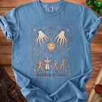 Blue t-shirt with "Master of Fate" graphic featuring dice, hands, and fantasy figures.