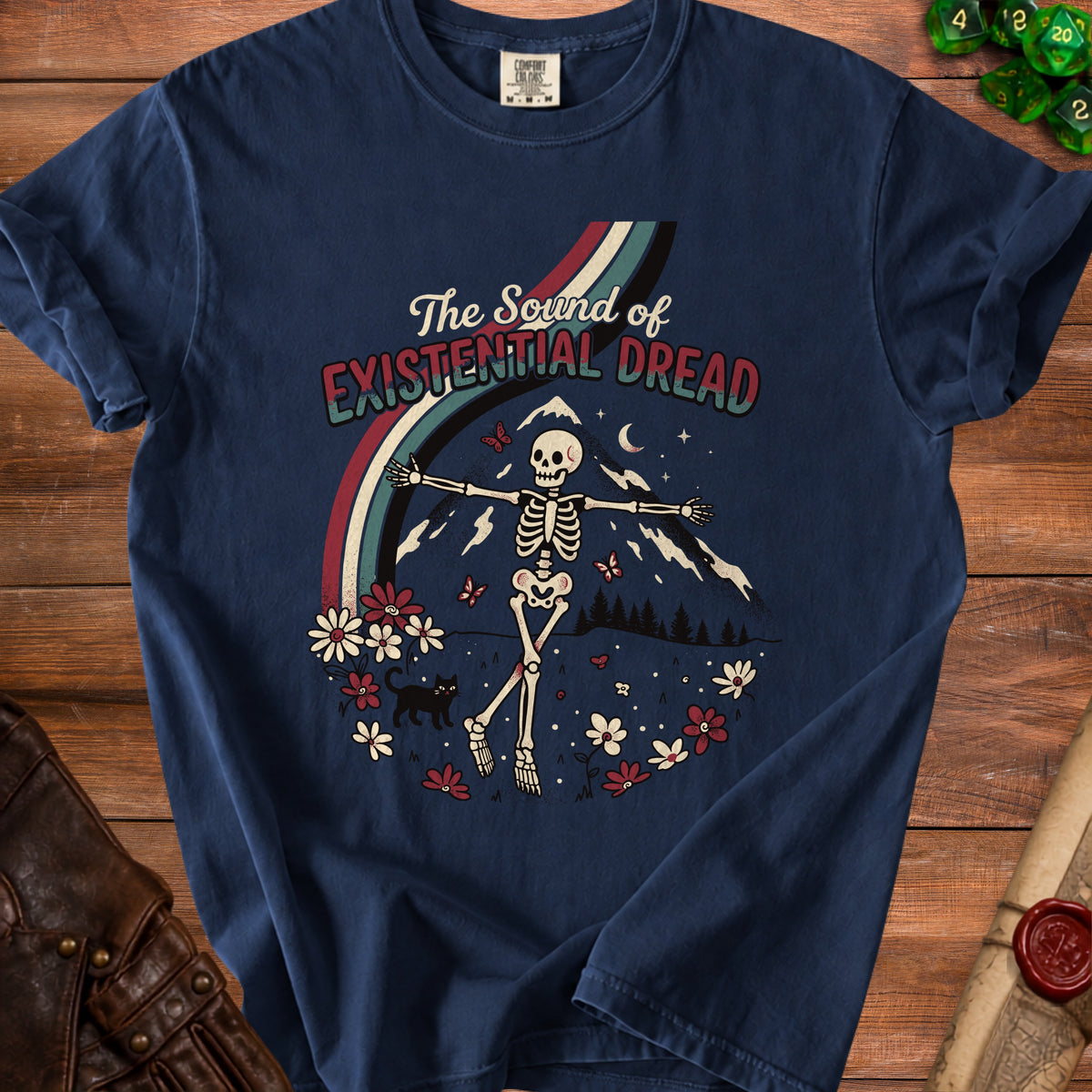 T-shirt with skeleton, flowers, mountains, and text "The Sound of Existential Dread".