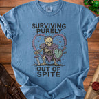 Blue t-shirt with graphic of skeleton warrior and text "Surviving Purely Out of Spite".