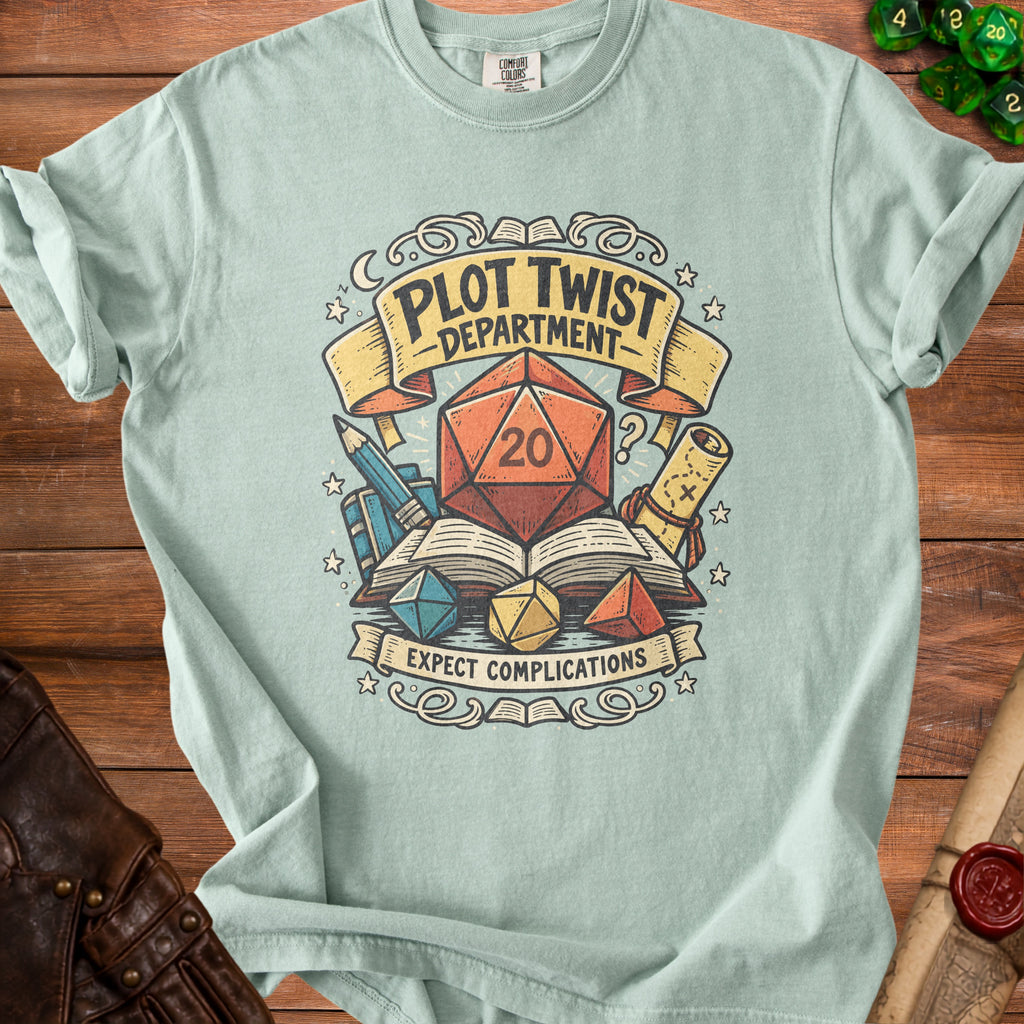 Light blue t-shirt with "Plot Twist Department" and "Expect Complications" graphic.