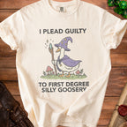 Cream t-shirt with a cartoon goose in a wizard hat holding a staff and reading "I PLEAD GUILTY TO FIRST DEGREE SILLY GOOSERY".