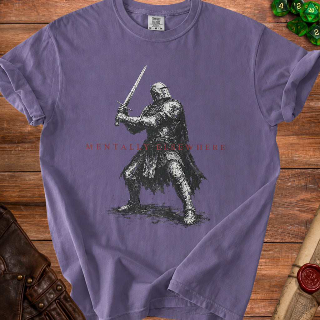 Knight with sword and cape on purple t-shirt with text "MENTALLY ELSEWHERE".